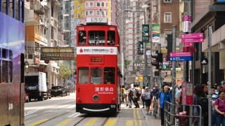 Hong Kong cityscape view with famous trams at Wan Chai district of Hong Kong