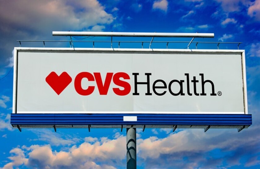 Advertisement billboard displaying logo of CVS Health Corp.