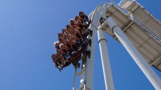Gardaland, italy 20 june 2019 . Young people screaming during a ride at roller coaster Gardaland park