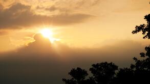 Morning sun through storm clouds