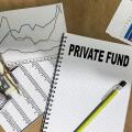 Concept of Private Fund write on book isolated on Wooden Table.