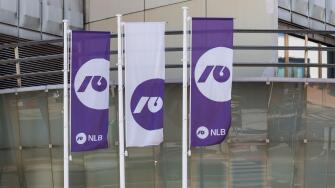 Flags with the Nova Ljubljanska banka logo, NLB logo, Slovenian bank