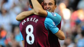 West Ham United's Mark Noble (right) celebrates with team mate Scott Parker, after his effort deflects off Blackburn Rovers' Christopher Samba to give West Ham United their second goal of the game.