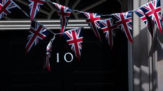 Union flag bunting is removed from the the front of No 10 Downing street after VE day, ahead of Prime Minister Boris Johnson address to the nation later this evening.