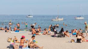 People on Bellevue Beach (Danish: 'Bellevue Strand'), Klampenborg, Denmark