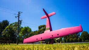 An old light aircraft sculpture at a remote service station in Australia