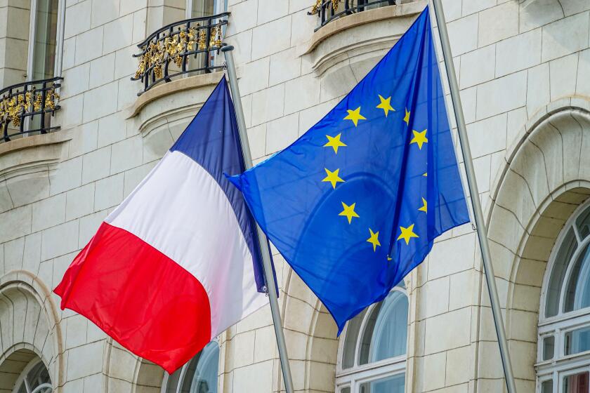 Flag of France and the flag of the European Union are next