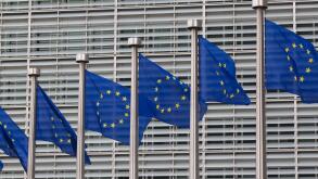 European flags in front of the Berlaymont building, headquarters of the European commission in Brussels, Belgium