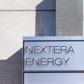 Houston, Texas, USA - February 27, 2022: NextEra Energy sign is seen at its office building in Houston, Texas, USA.