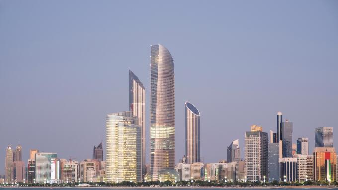 Skyline of modern buildings along Corniche waterfront in Abu Dhabi United Arab Emirates