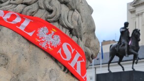 Poland scarf on a statue in Warsaw at Euro 2012
