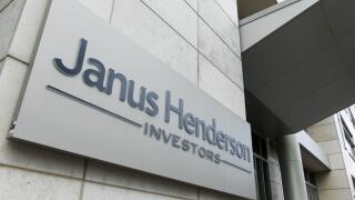 A logo sign outside of a facility occupied by the Janus Henderson Group in Denver, Colorado, on July 23, 2018. (Photo by Kristoffer Tripplaar/Sipa USA)