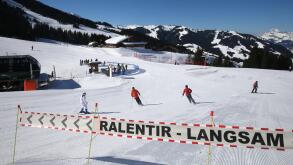 French Alps. Skiers slow sign. France.