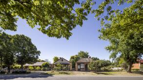 The suburban street with houses and trees in Beechworth, Victoria, Australia