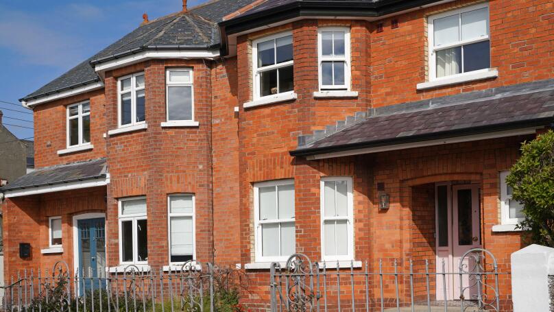 Row of traditional older semi-detached houses