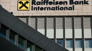 A logo sign outside of the headquarters of Raiffeisen Bank International (RBI) in Vienna, Austria, on September 5, 2018.