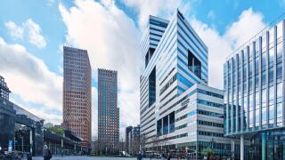 Netherlands, Amsterdam - April 07, 2024: Houthoff Buruma Office (Ito Building) at business district Zuidas, Gustav Mahlerplein