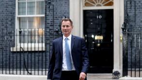 London, UK. 14th Oct, 2022. Newly appointed UK Chancellor of the Exchequer Jeremy Hunt leaves 10 Downing Street in London, Britain, on Oct. 14, 2022. Jeremy Hunt, former foreign secretary of the United Kingdom (UK), has been appointed as chancellor of the