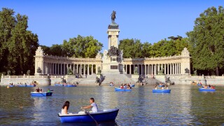 Summer boating on lake in Retiro Park, Madrid