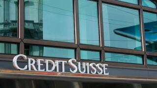 A logo sign outside of a facility occupied by the Credit Suisse Group in Milan, Italy on September 3, 2016.
