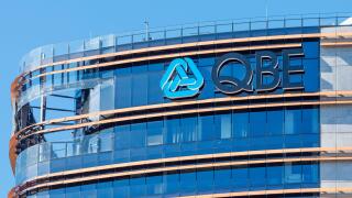 The logo and name of the Insurance giant, QBE on a building in Parramatta, Sydney, New South Wales, Australia