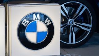 A luxury BMW sports car exhibited at the Brussels Zaventem Airport in Belgium.