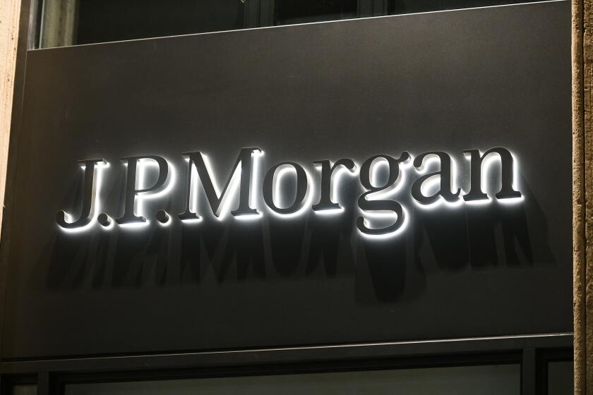 Milan, Italy - September 24, 2021: JP Morgan logo displayed on a facade of a store in Milan.