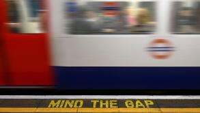 Mind the Gap Warning Sign on the Platform Edge of a London Underground Station.