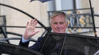 French Prime Minister Michel Barnier boards a car after the first weekly cabinet meeting at the Elysee Palace Monday, Sept. 23, 2024 in Paris. (AP Photo/Christophe Ena)