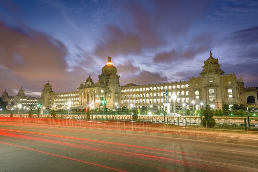 Iconic Vidhana Soudha , Landmark of Bangalore, Karnataka, India during a beautiful sunset. Bangalore cityscape .Government building. Commercial & Technology Hub . Modern Bengaluru city. Pub culture