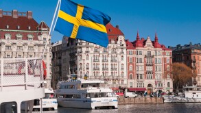 Harbour and Hotel Diplomat. Swedish flag. Ostermalm Stockholm Sweden