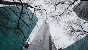 The Bank of America Tower and the 1095 Avenue of the Americas building seen between bare treetops of the Bryant Park. Midtown Manhattan, NYC, NY, USA