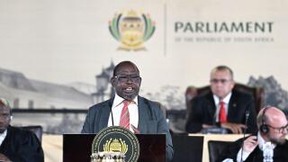 Cape Town, South Africa. 2nd Apr, 2025. South African Finance Minister Enoch Godongwana (Front) speaks during the debate on the 2025 Budget in parliament in Cape Town, South Africa, on April 2, 2025. South Africa's parliament on Wednesday passed the 2025