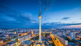 Berlin skyline with famous TV tower at Alexanderplatz in twilight at dusk, Germany