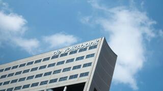 UTRECHT / NETHERLANDS - APRIL 15, 2019: DE VOLKSBANK sign at building exterior against a blue sky