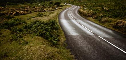 Empty country road through moorland.