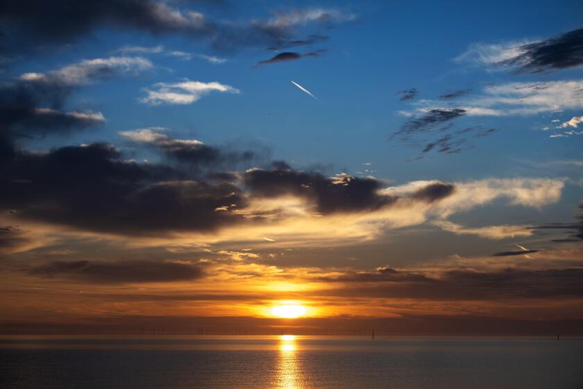 Summer sunrise over the Thames Estuary, Kent, United Kingdom