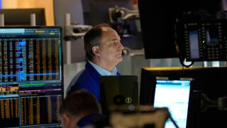 James Conti works on the floor at the New York Stock Exchange in New York, Monday, April 7, 2025. (AP Photo/Seth Wenig)
