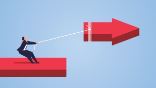 Businessman uses the rope to pull back the broken arrow