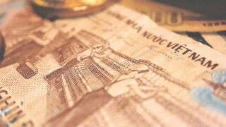 Close up the Vietnamese Dong Banknotes and Bitcoin