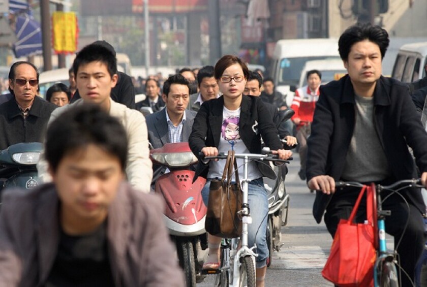 Crowd cycling China green transport from Alamy 28Mar21