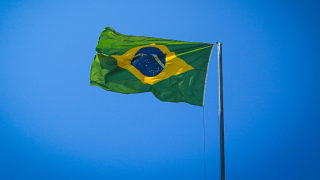  Flag of the Federative Republic of Brazil flying in the wind