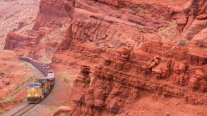 A train hauling uranium tailings as part of the UMTRA project leaves Moab, Utah.