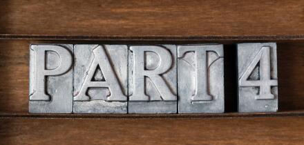 part four phrase made from metallic letterpress type on wooden tray