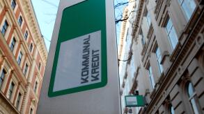The logo of Kommunalkredit is pictured in front of its headquarters building in Vienna, March 5, 2012. Nationalised Austrian lender Kommunalkredit could need as much as one billion euros ($1.3 billion) as it tries to address its exposure to Greece, the co