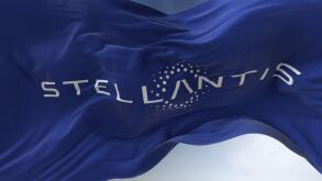 Amsterdam, Holland, March 2022: Close-up view of the blue flag with the Stellantis logo waving in the wind. Stellantis is a Dutch multinational motor