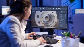 Woman engineer working on new digital prototype using professional construction equipment late at night at office company. Entrepreneur looking at technical architecture before deadline