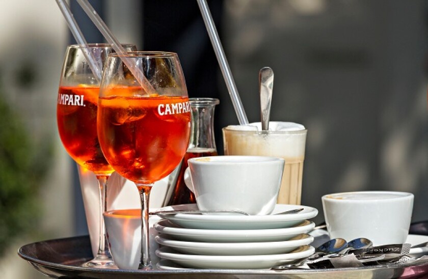 Glasses of Campari Soda with Cups of Coffee on Tray