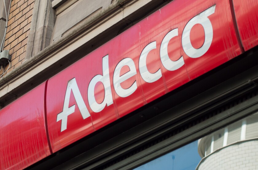 Mulhouse- France - 31 August 2019 - Closeup of Adecco sign on building facade, Adecco is the famous french Temporary work agency