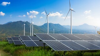 Photovoltaic modules solar power plant with wind turbines -adobe